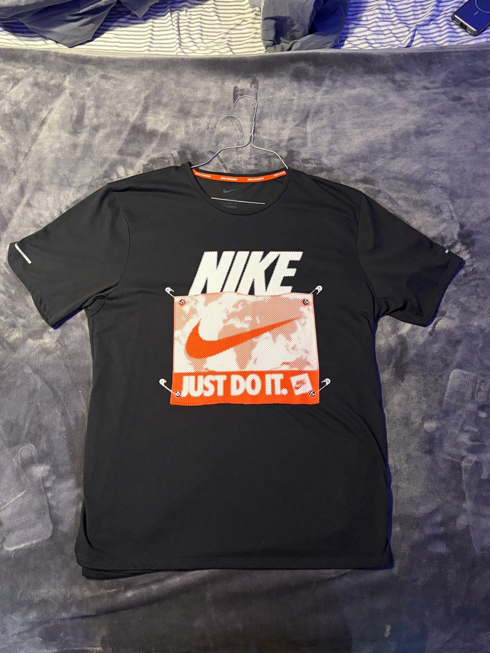 Nike Black Short-Sleeve Graphic Tee with Orange Swoosh